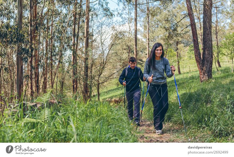 Couple of hikers doing trekking Lifestyle Happy Vacation & Travel Trip Adventure Mountain Hiking Sports Climbing Mountaineering Human being Woman Adults Man