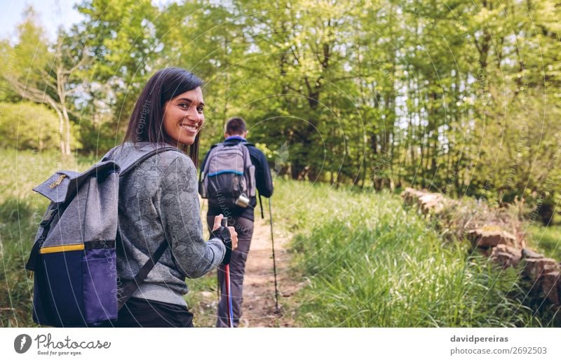 Woman doing trekking looking at camera Lifestyle Joy Happy Beautiful Vacation & Travel Trip Adventure Mountain Hiking Sports Climbing Mountaineering Human being