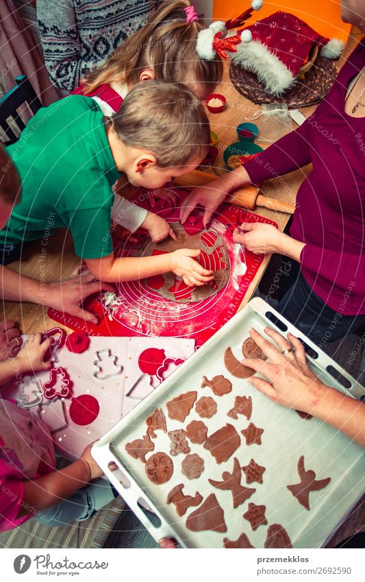 Baking Christmas cookies at home Dough Baked goods Cake Dessert Candy Lifestyle Table Kitchen Feasts & Celebrations Christmas & Advent Human being Child Girl