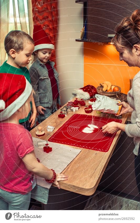 Baking Christmas cookies at home Dough Baked goods Cake Lifestyle Table Kitchen Feasts & Celebrations Christmas & Advent Human being Child Girl Boy (child)