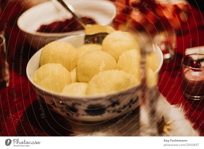 red cabbage and dumplings as a traditinional german christmas dish bowl celebration christmas dinner cook cuisine delicacy eat feast festive food gastronomy