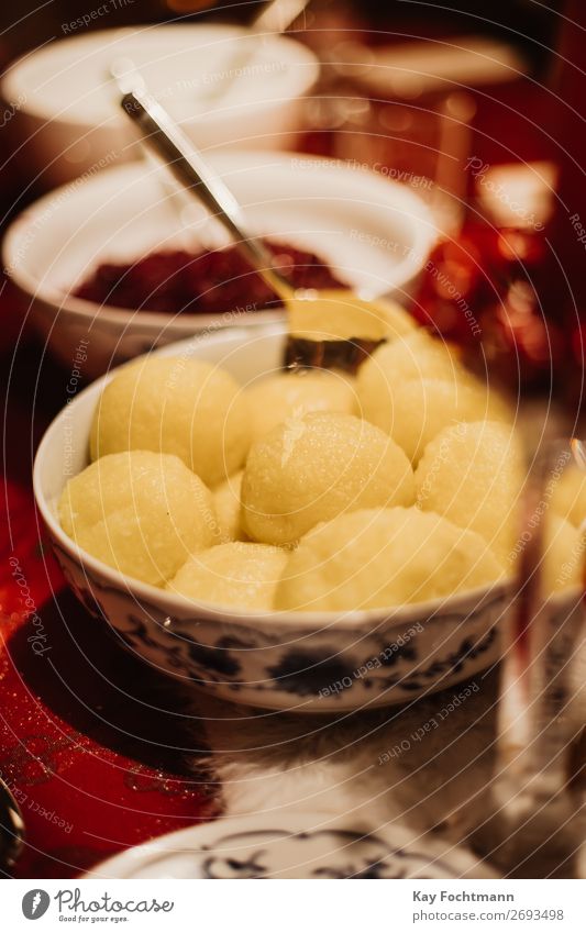 red cabbage and dumplings as a traditinional german christmas dish bowl celebration christmas dinner cook cuisine delicacy eat feast festive food gastronomy