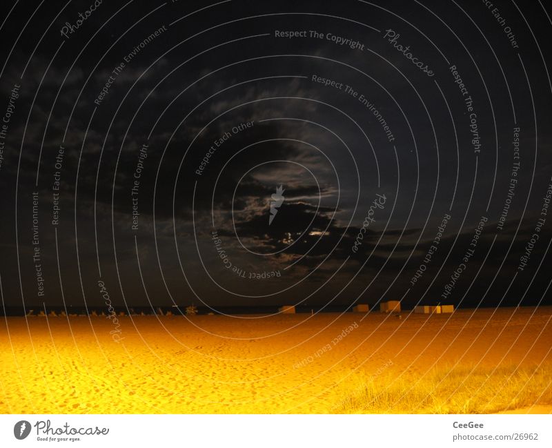 Night at the beach Clouds Beach Yellow Black Dark Light Ocean Long exposure Sky Sand Moon Lighting Water