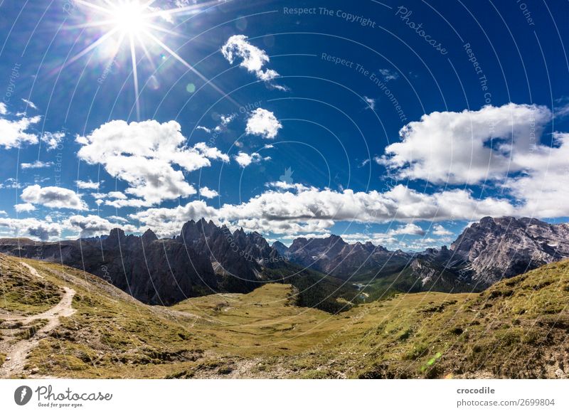 # 836 Three peaks Dolomites Sexten Dolomites World heritage High plain Colour photo Hiking Footpath Peak Mountaineering Alps Beautiful weather Meadow Summer Sun