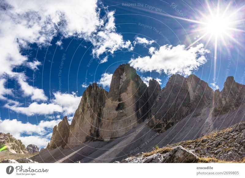 # 787 Three peaks Dolomites Sexten Dolomites World heritage High plain Colour photo Hiking Footpath Peak Mountaineering Alps Beautiful weather Meadow Summer Sun