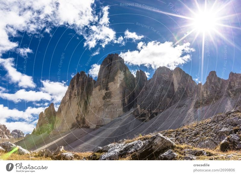 # 786 Three peaks Dolomites Sexten Dolomites World heritage High plain Colour photo Hiking Footpath Peak Mountaineering Alps Beautiful weather Meadow Summer Sun