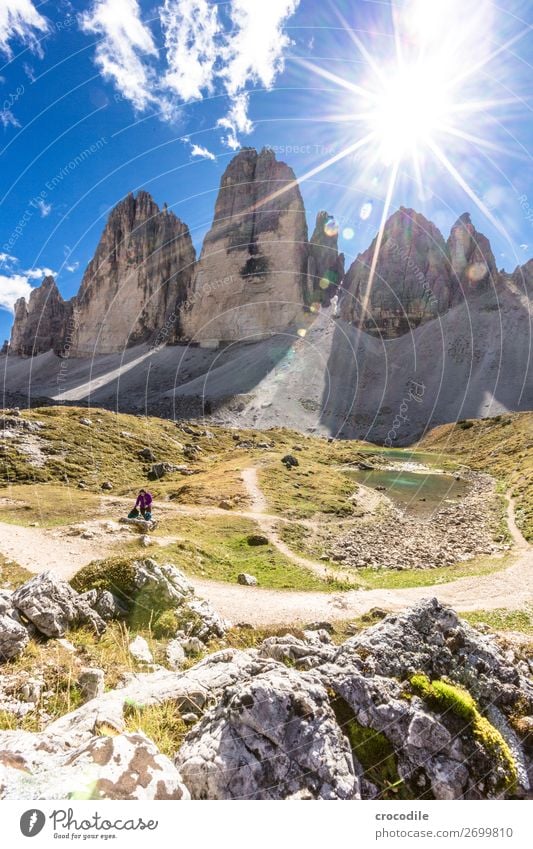 # 782 Three peaks Dolomites Sexten Dolomites World heritage High plain Colour photo Hiking Footpath Peak Mountaineering Alps Beautiful weather Meadow Summer Sun