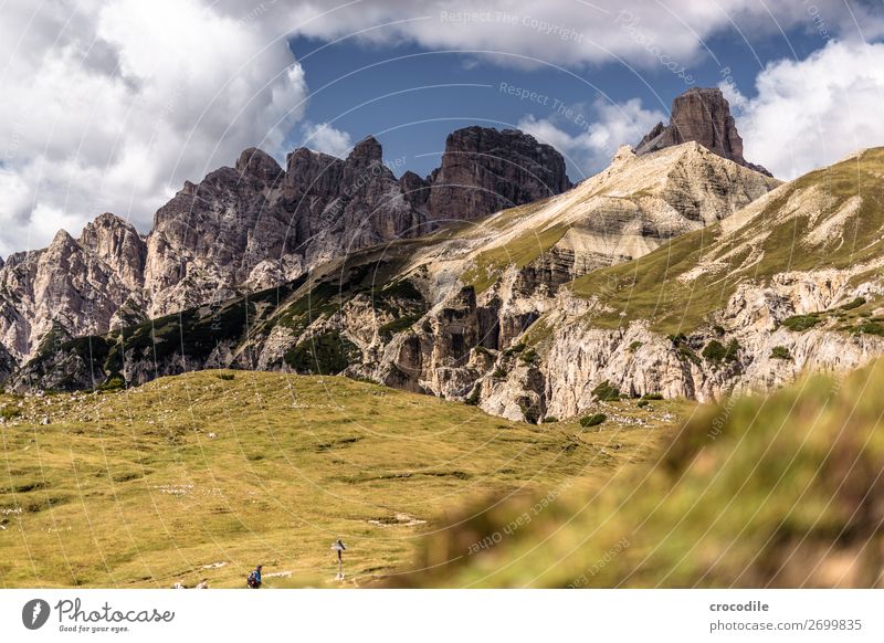 # 819 Three peaks Dolomites Sexten Dolomites World heritage High plain Colour photo Hiking Footpath Peak Mountaineering Alps Beautiful weather Meadow Summer Sun