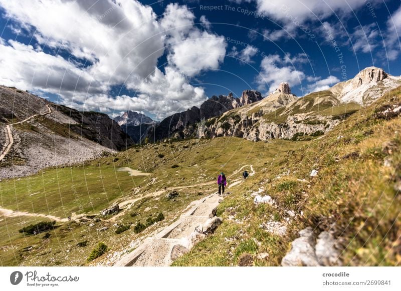 # 792 Three peaks Dolomites Sexten Dolomites World heritage High plain Colour photo Hiking Footpath Peak Mountaineering Alps Beautiful weather Meadow Summer Sun