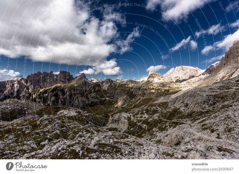 # 805 Three peaks Dolomites Sexten Dolomites World heritage High plain Colour photo Hiking Footpath Peak Mountaineering Alps Beautiful weather Meadow Summer Sun