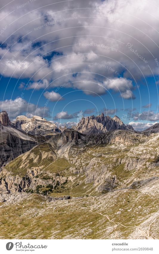 # 804 Three peaks Dolomites Sexten Dolomites World heritage High plain Colour photo Hiking Footpath Peak Mountaineering Alps Beautiful weather Meadow Summer Sun