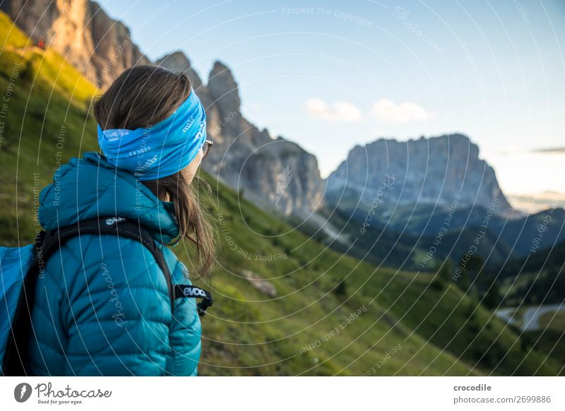 Dolomites High plain Colour photo Hiking Footpath Peak Mountaineering Alps Beautiful weather Meadow Summer Climbing Clouds Grödener Joch Pass Sunset Woman