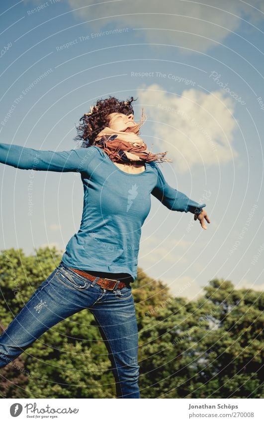 young woman jumps for joy with outstretched arms towards the sky Joy luck Life Human being Feminine Young woman Youth (Young adults) 1 18 - 30 years Adults