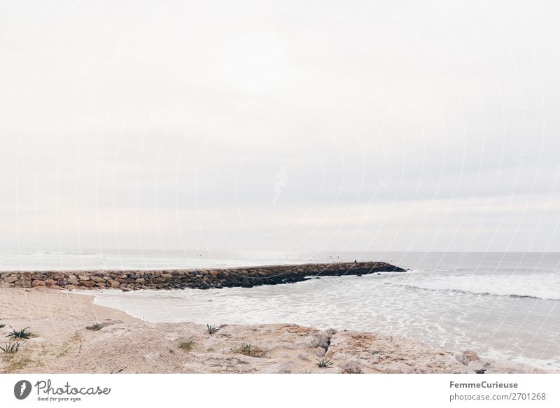 Coast on the Atlantic in Portugal Nature Vacation & Travel Rock Waves Swell Clouds Travel photography Vacation destination Sandy beach Colour photo