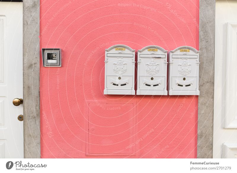 Mailboxes on colourful house wall in Portugal Town Living or residing Pink White Facade Multicoloured Apartment Building 3 Colour photo Exterior shot Day