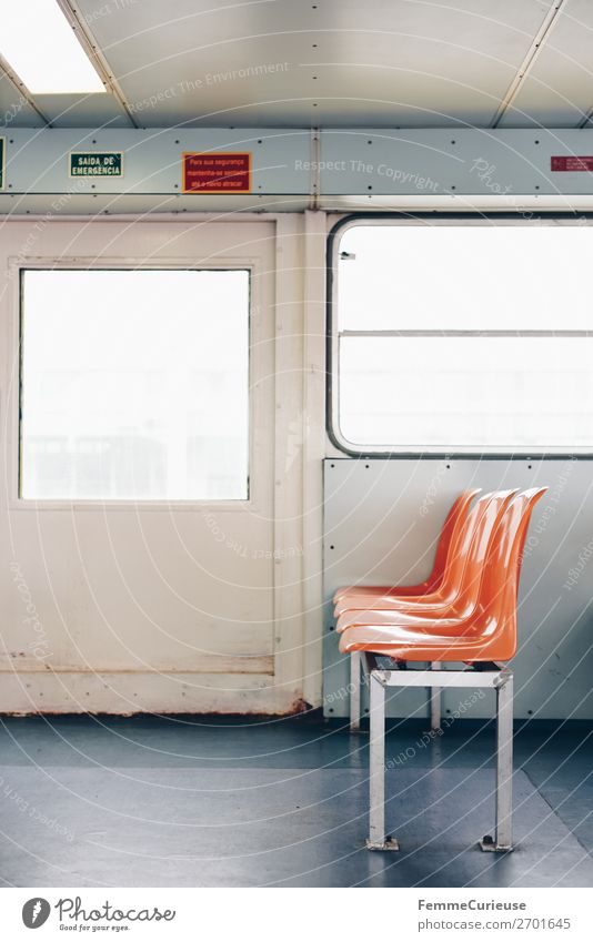 Interior of a ferry with colourful seats Transport Means of transport Passenger traffic Navigation Passenger ship Ferry Movement Portugal Lisbon Seating Orange