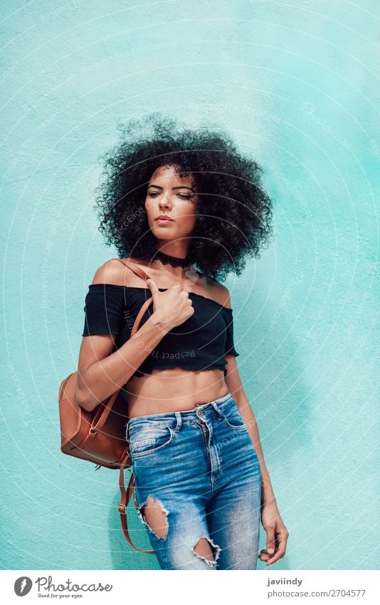 Young mixed woman with afro hair standing on the street Lifestyle Style Happy Beautiful Hair and hairstyles Face Human being Feminine Young woman