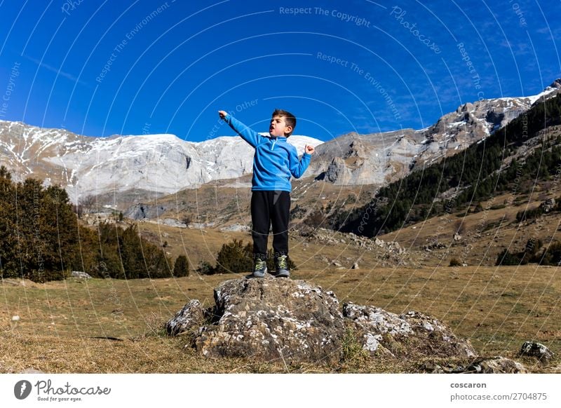 Little mountaineer on the peak of the mountains Joy Beautiful Leisure and hobbies Vacation & Travel Adventure Summer Winter Snow Winter vacation Mountain Hiking