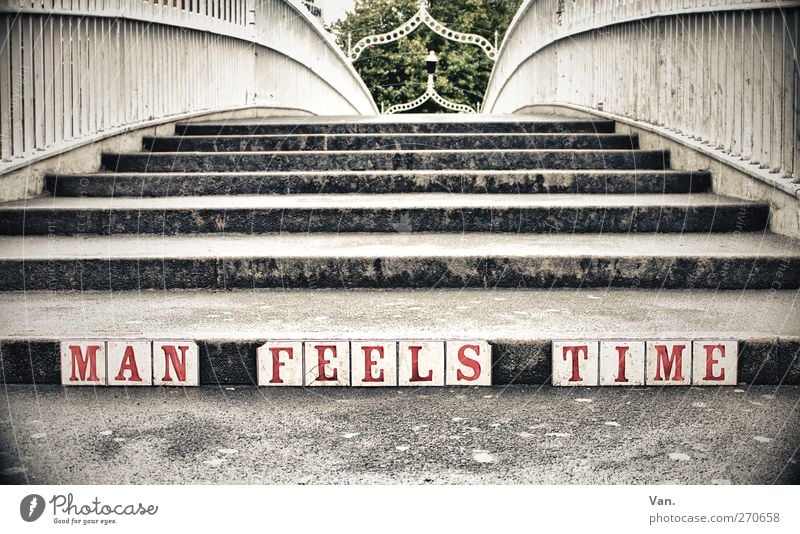 Man feels time Dublin Town Bridge Stairs Handrail Stone Concrete Old Gray Letters (alphabet) Word Transience Colour photo Subdued colour Exterior shot Deserted