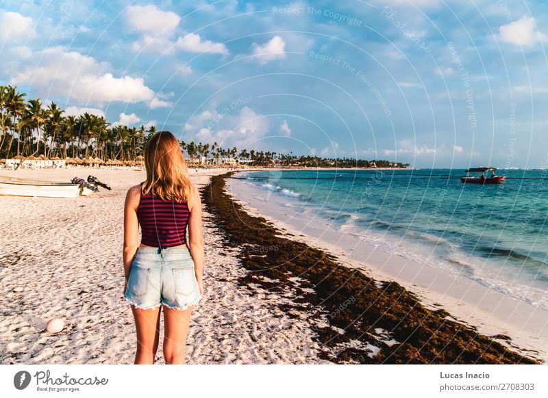 Girl at Bavaro Beaches in Punta Cana, Dominican Republic Happy Vacation & Travel Tourism Summer Ocean Island Woman Adults Environment Nature Sand Coast Blonde