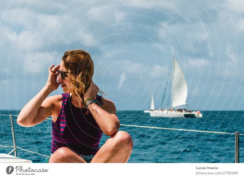 Girl in a boat near Saona Island, Dominican Republic Happy Vacation & Travel Tourism Summer Beach Ocean Woman Adults Environment Nature Sand Coast Watercraft