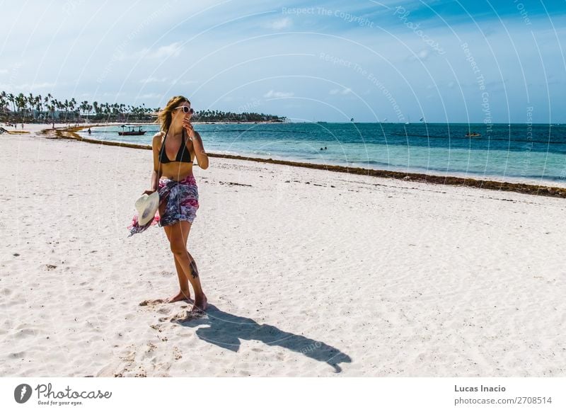 Girl at Bavaro Beaches in Punta Cana, Dominican Republic Happy Vacation & Travel Tourism Summer Ocean Island Woman Adults Environment Nature Sand Coast Blonde