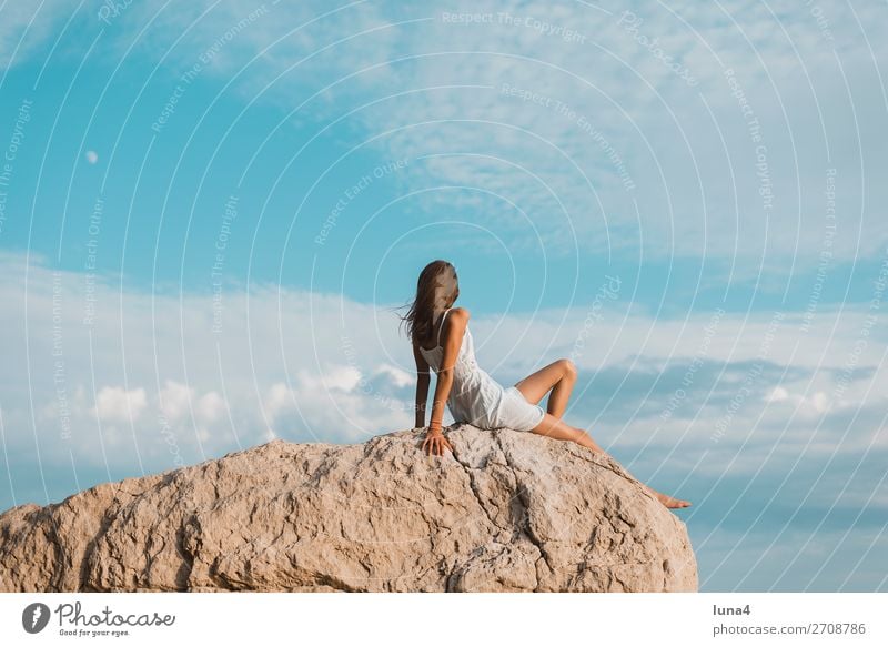 Girls on rocks Lifestyle Happy Relaxation Calm Leisure and hobbies Vacation & Travel Tourism Summer Environment Nature Landscape Water Rock Coast Dress Sit