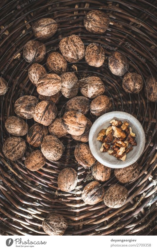 Walnuts in a vintage basket. Bowl Nature Autumn Old Authentic Natural Brown walnuts Mussel shell To break (something) food cracking Organic Nutshell cracker