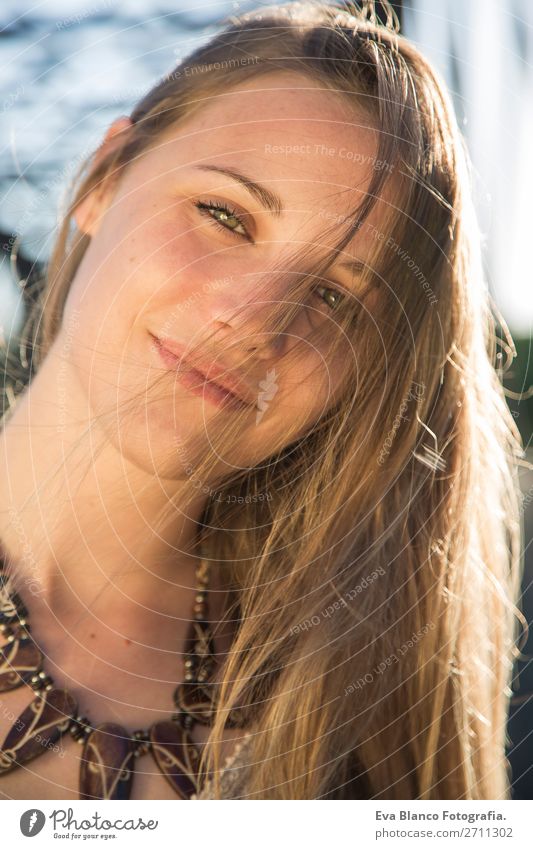 portrait of a beautiful woman at sunset Lifestyle Joy Happy Beautiful Skin Face Relaxation Summer Sun Human being Woman Adults Hand Nature Landscape Warmth