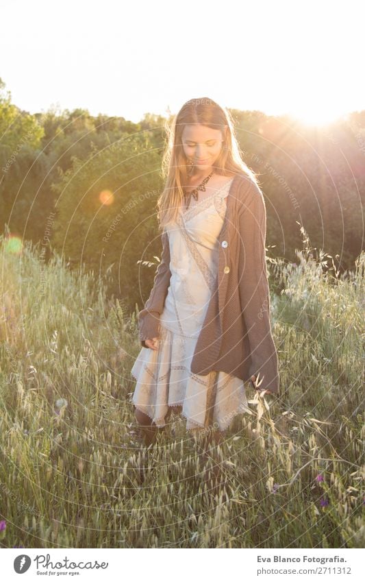 outdoors portrait of a beautiful young woman at sunset Lifestyle Joy Happy Beautiful Skin Face Relaxation Summer Sun Human being Woman Adults Hand Nature