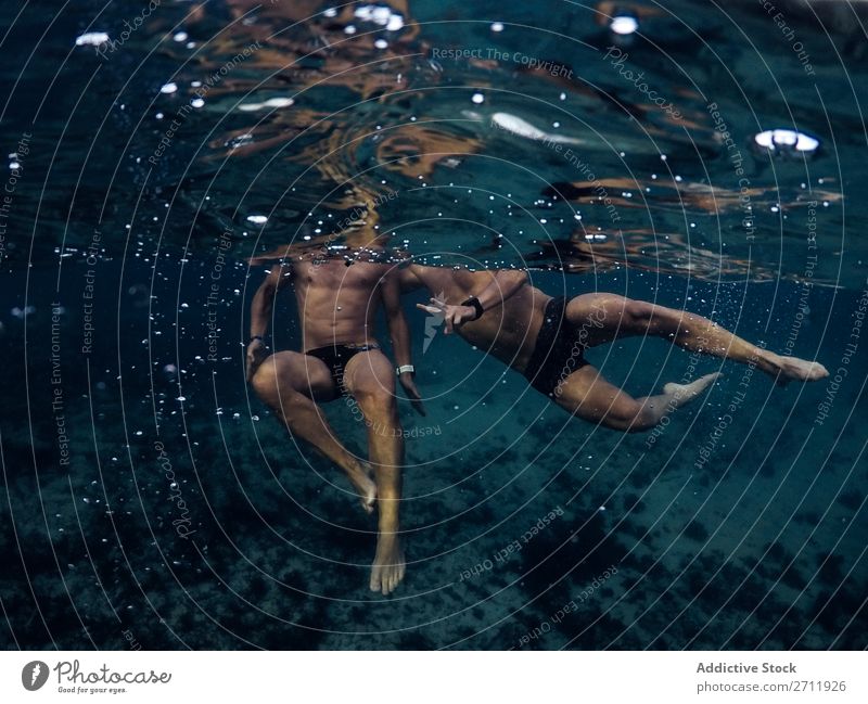 Men swimming in ocean Human being Swimming Ocean Underwater photo Couple Friendship Homosexual Water Blue Nature Joy Lifestyle Leisure and hobbies marine