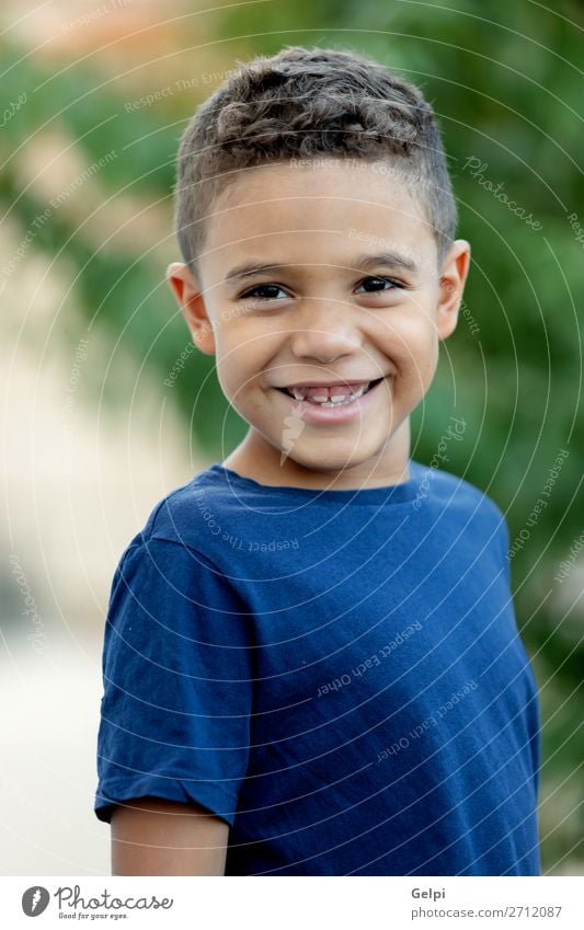 Adorable latin child in the garden Lifestyle Joy Face Playing Garden Child Human being Boy (child) Man Adults Infancy Nature Park Smiling Happiness Hot Small