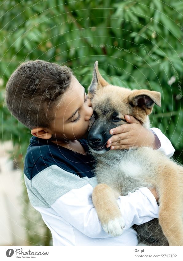 Latin child with his dog Lifestyle Joy Happy Face Relaxation Leisure and hobbies Child Human being Boy (child) Man Adults Family & Relations Friendship Infancy