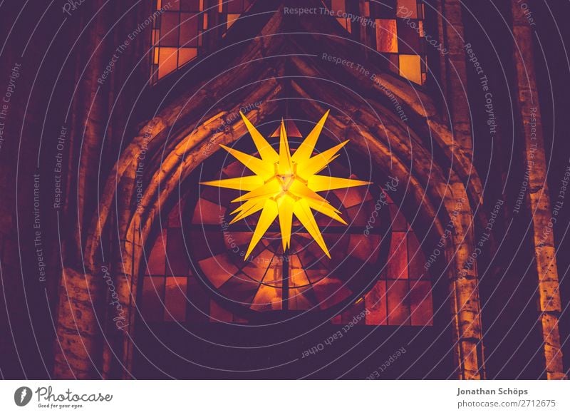 Herrnhuter Stern hangs from a church in Advent Christmas & Advent Facade Hang Retro Yellow Violet Hope Tradition Advent star Herrnhuter Star Church window