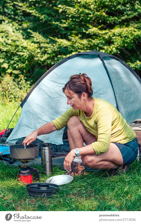 Spending a vacation on camping Lifestyle Relaxation Vacation & Travel Tourism Trip Adventure Camping Summer vacation Woman Adults 1 Human being 30 - 45 years