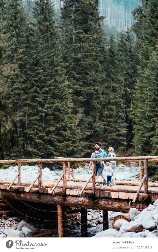 Family walking across the wooden bridge in mountains Lifestyle Joy Happy Relaxation Leisure and hobbies Vacation & Travel Tourism Trip Adventure Summer