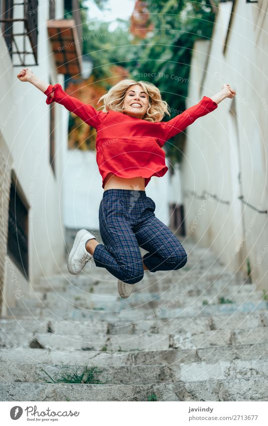 Happy young woman standing on beautiful steps Lifestyle Style Joy Beautiful Hair and hairstyles Human being Feminine Young woman Youth (Young adults) Woman