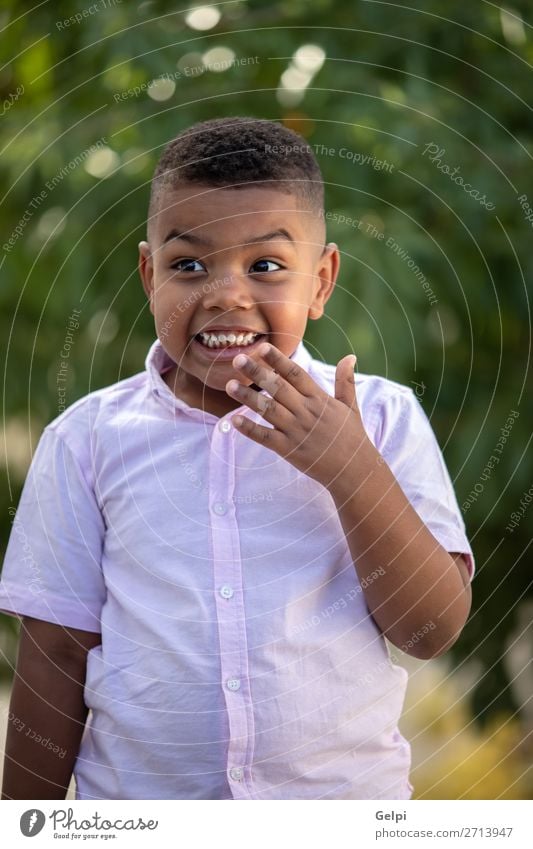 Surprised colombian child in a park Joy Happy Beautiful Child Human being Baby Boy (child) Man Adults Infancy Nature Park Smiling Laughter Funny Cute Emotions