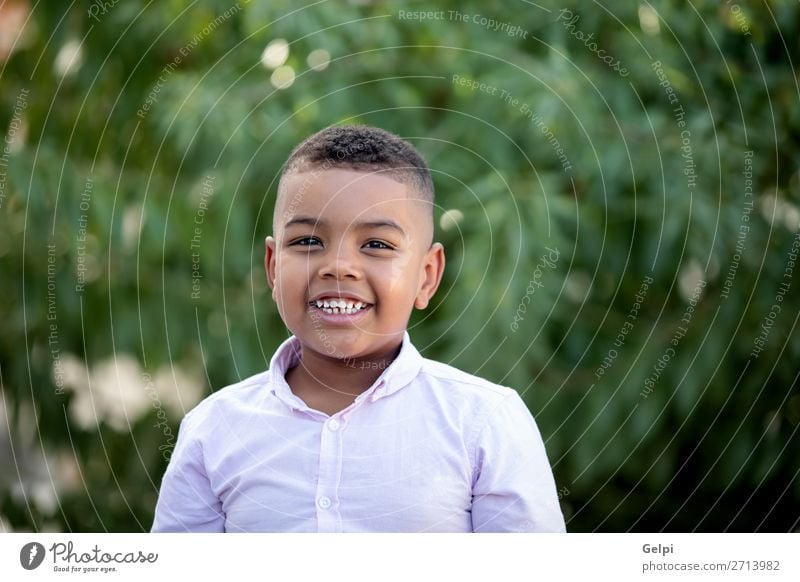 Adorable latin child in the garden Lifestyle Joy Face Playing Garden Child Human being Boy (child) Man Adults Infancy Nature Park Smiling Happiness Hot Small