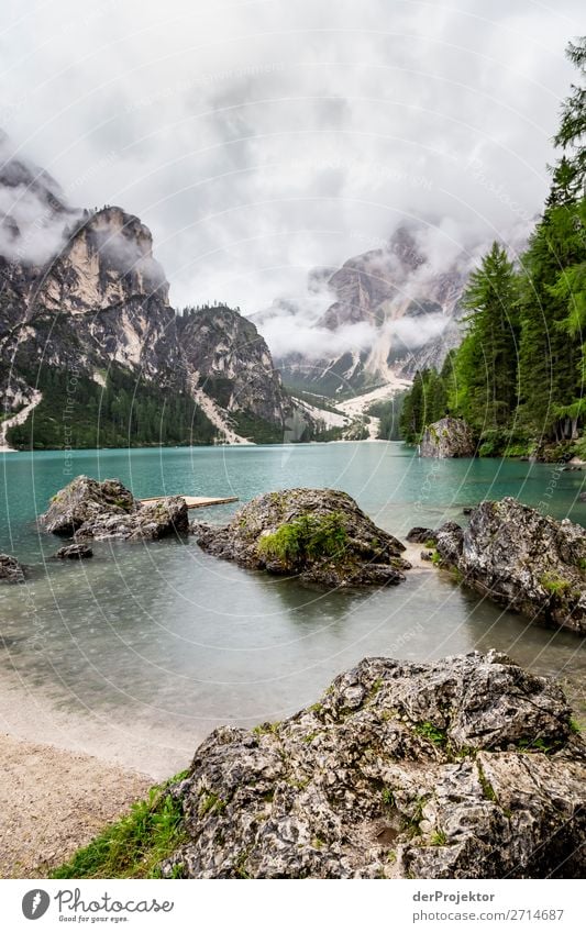 Braies Lake with clouds in the Dolomites III Tourism Structures and shapes Copy Space bottom Vacation & Travel Light Copy Space right Shadow Contrast