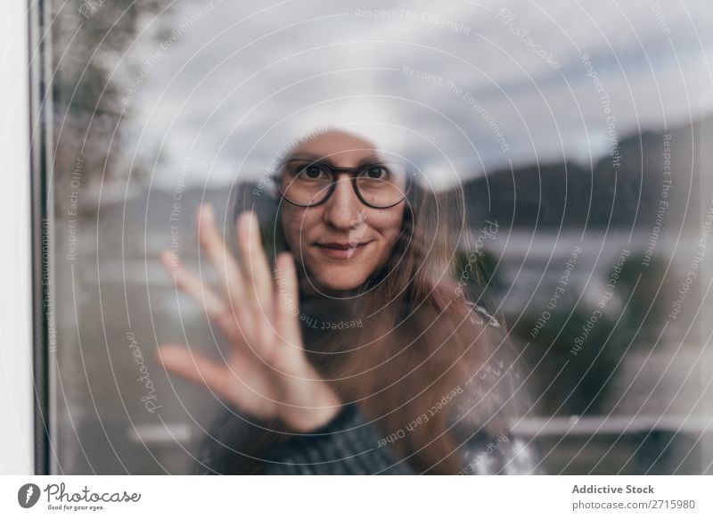 Woman in glasses at window Window Posture pretty through glass Touch Person wearing glasses Youth (Young adults) Beauty Photography Girl Model Attractive