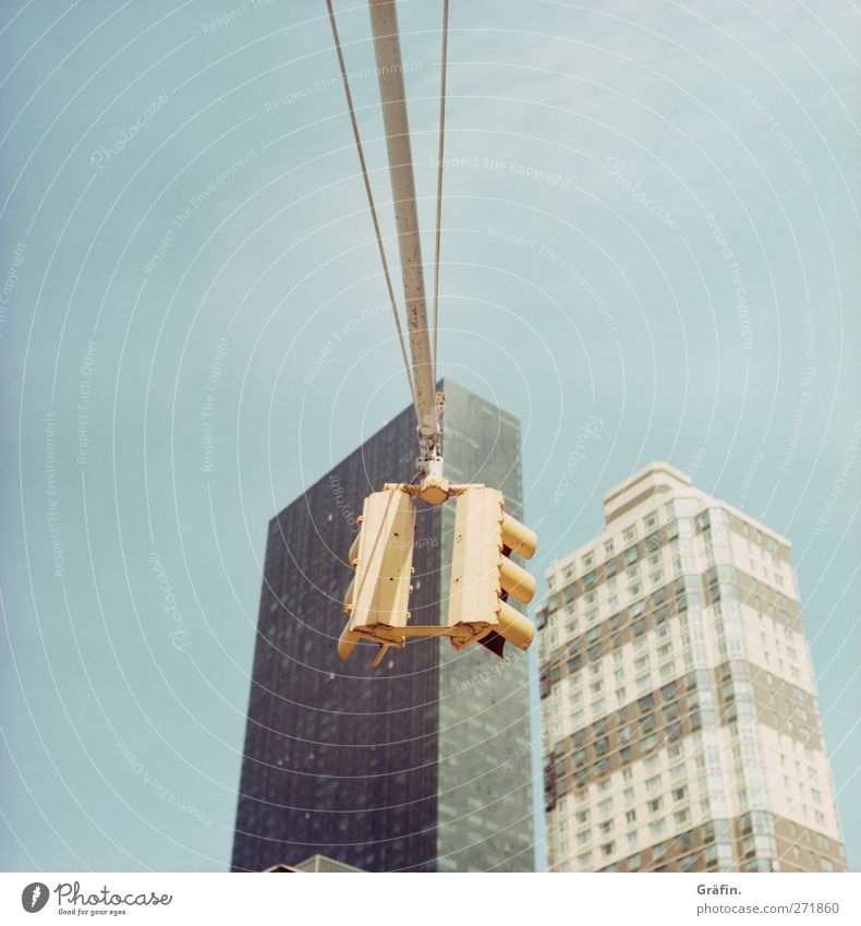 New York City Sky Town Skyline High-rise Architecture Transport Street Traffic light Blue Yellow Gray Haste Colour photo Exterior shot Deserted Copy Space top