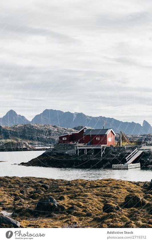 House with pier at lake House (Residential Structure) Small Jetty Lake Water Coast Hill Mountain Peak Nature Vacation & Travel Vantage point Picturesque