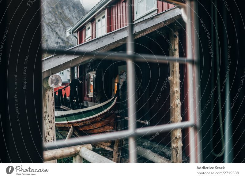 Boat under roof Watercraft Roof Village Fishery House (Residential Structure) Old Mountain Shabby Vacation & Travel Building Wood Timber Transport Vessel Shed