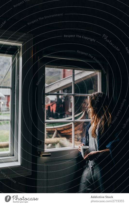 Woman with mug near window Coffee Window Morning Human being Mug Tea Drinking Beautiful pretty Attractive Relaxation Rest Leisure and hobbies Beverage enjoying