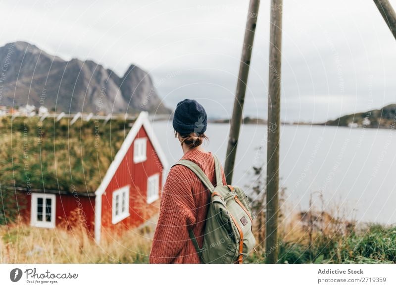 Woman looking at mountain lake Lake Mountain enjoying House (Residential Structure) Nature Landscape breathtaking Water Sky Vantage point Vacation & Travel