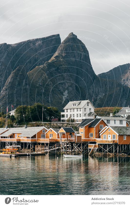 Houses on lake shore Lake Village Mountain Nature Landscape House (Residential Structure) breathtaking Water Coast Sky Vantage point Majestic Calm Peak