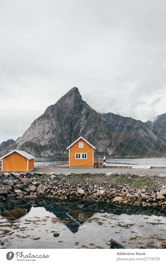 Mountain village near lake Lake Village Nature Landscape House (Residential Structure) breathtaking Water Coast Sky Vantage point Majestic Calm Peak