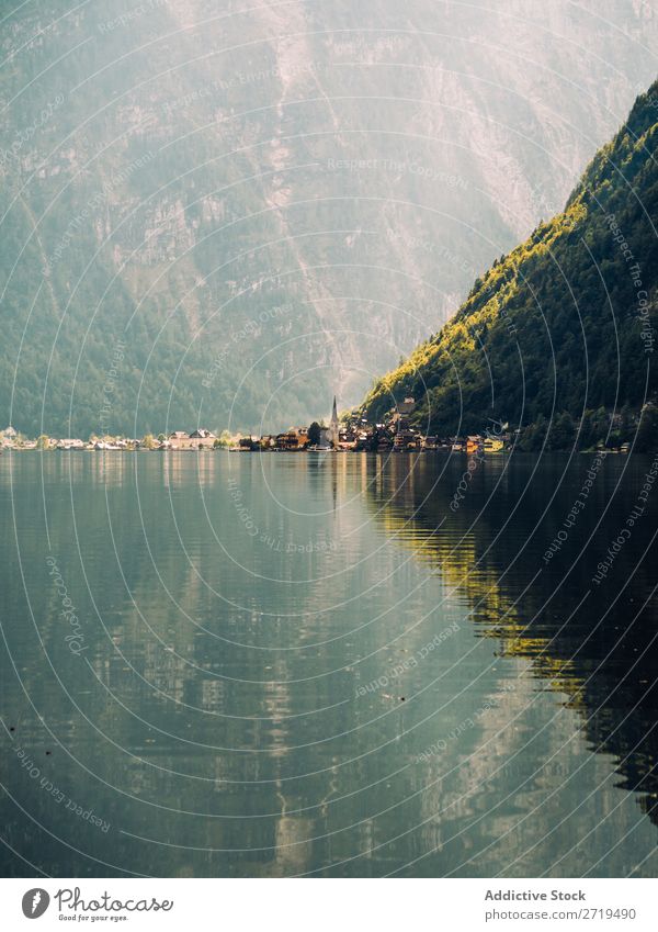 Lake and mountains on background Mountain Reflection coniferous Landscape Evergreen Calm Rural Mirror Water tranquil Surface scenery Serene Peaceful Forest