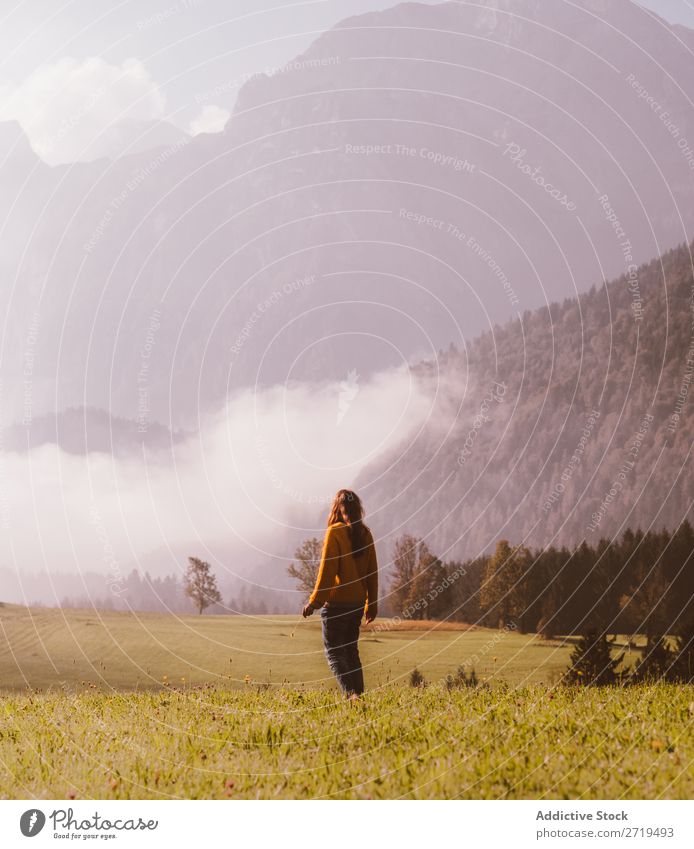 Woman in fields Mountain Landscape Tourist Valley Vacation & Travel Nature Field Adventure Green Natural Walking trekking Panorama (Format) Destination